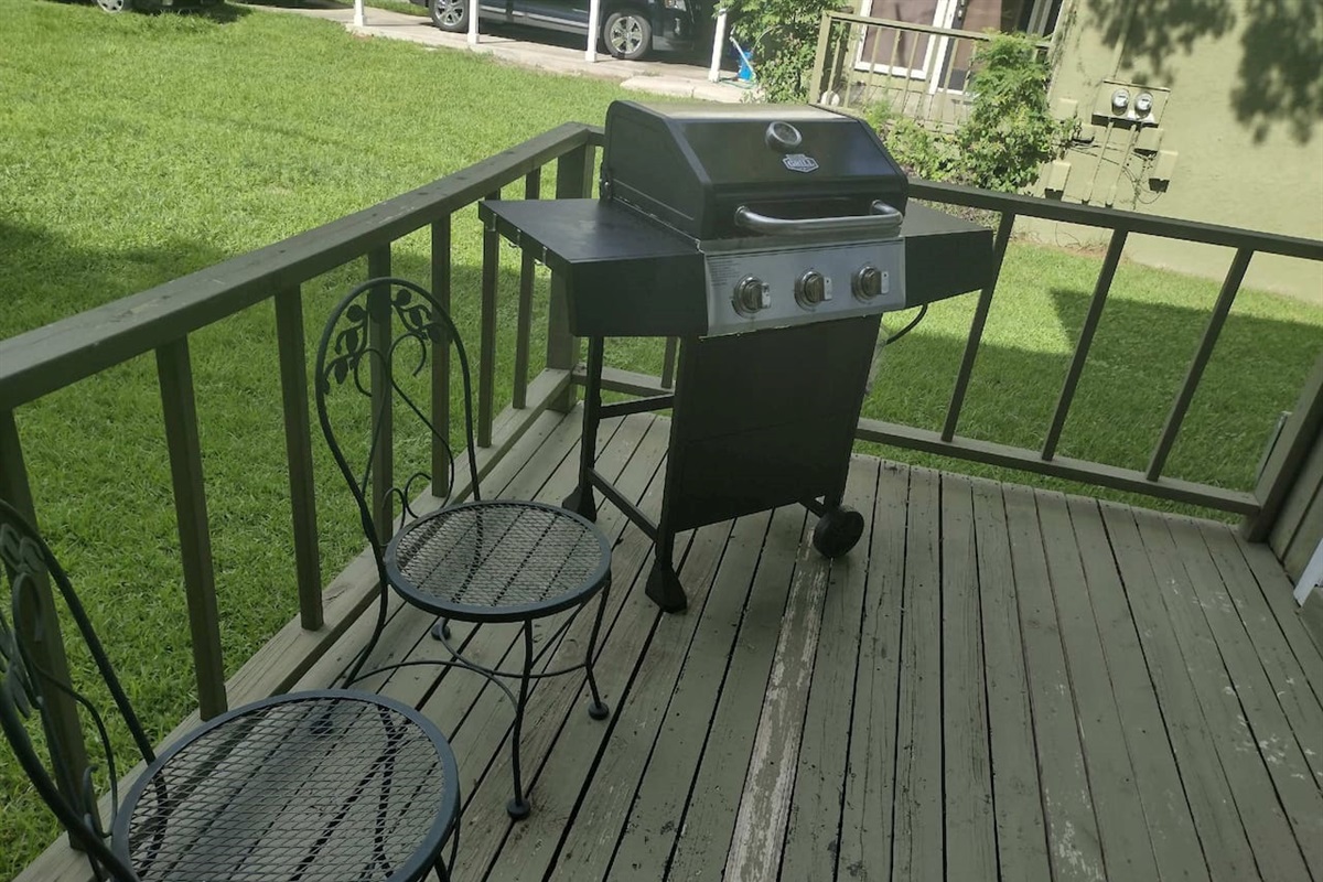 Front porch with grill and seating