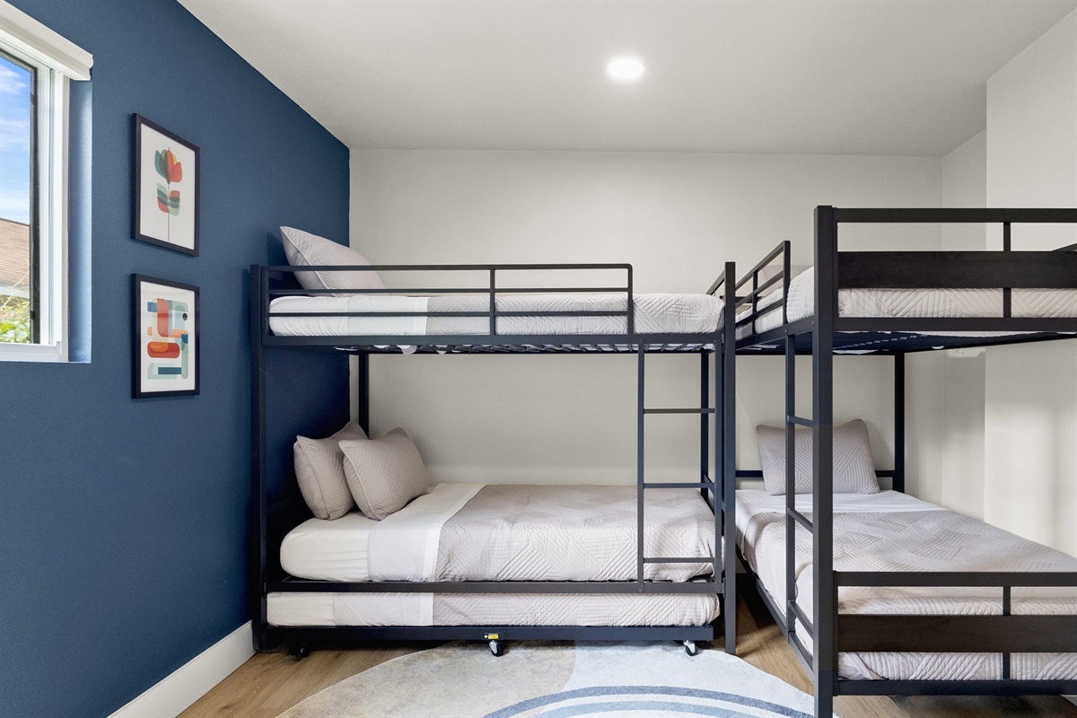 Children will love two bedrooms with two bunk beds and an additional twin trundle, perfect for a cozy night's sleep.