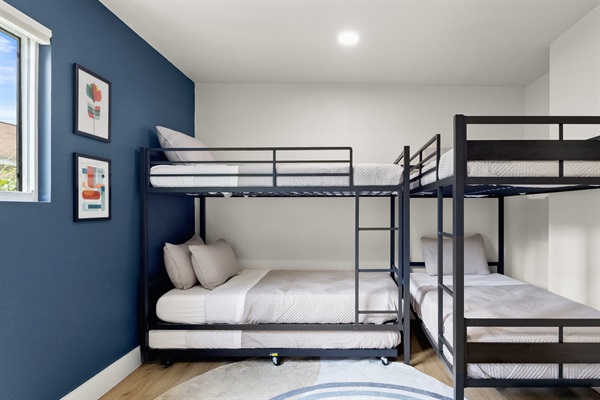 Children will love two bedrooms with two bunk beds and an additional twin trundle, perfect for a cozy night's sleep.