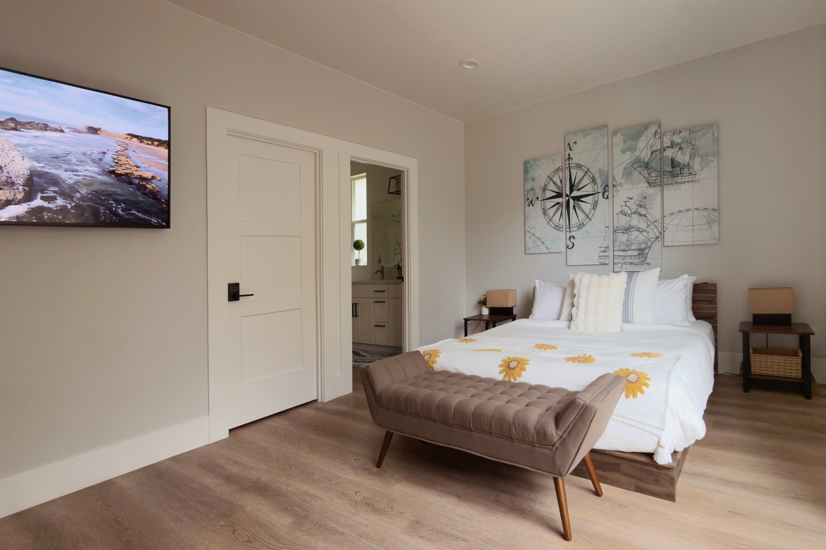 Primary bedroom with a king bed, premium soft foam mattress, hotel-grade 400-thread-count Egyptian cotton sheets, and a 55-inch smart 4K TV. True comfort while you’re on vacation.