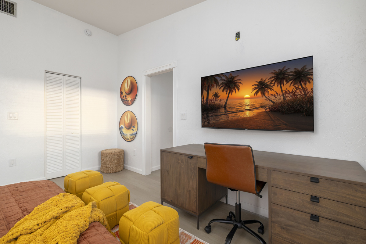 Like all the bedrooms, this bedroom has a large TV for your enjoyment.