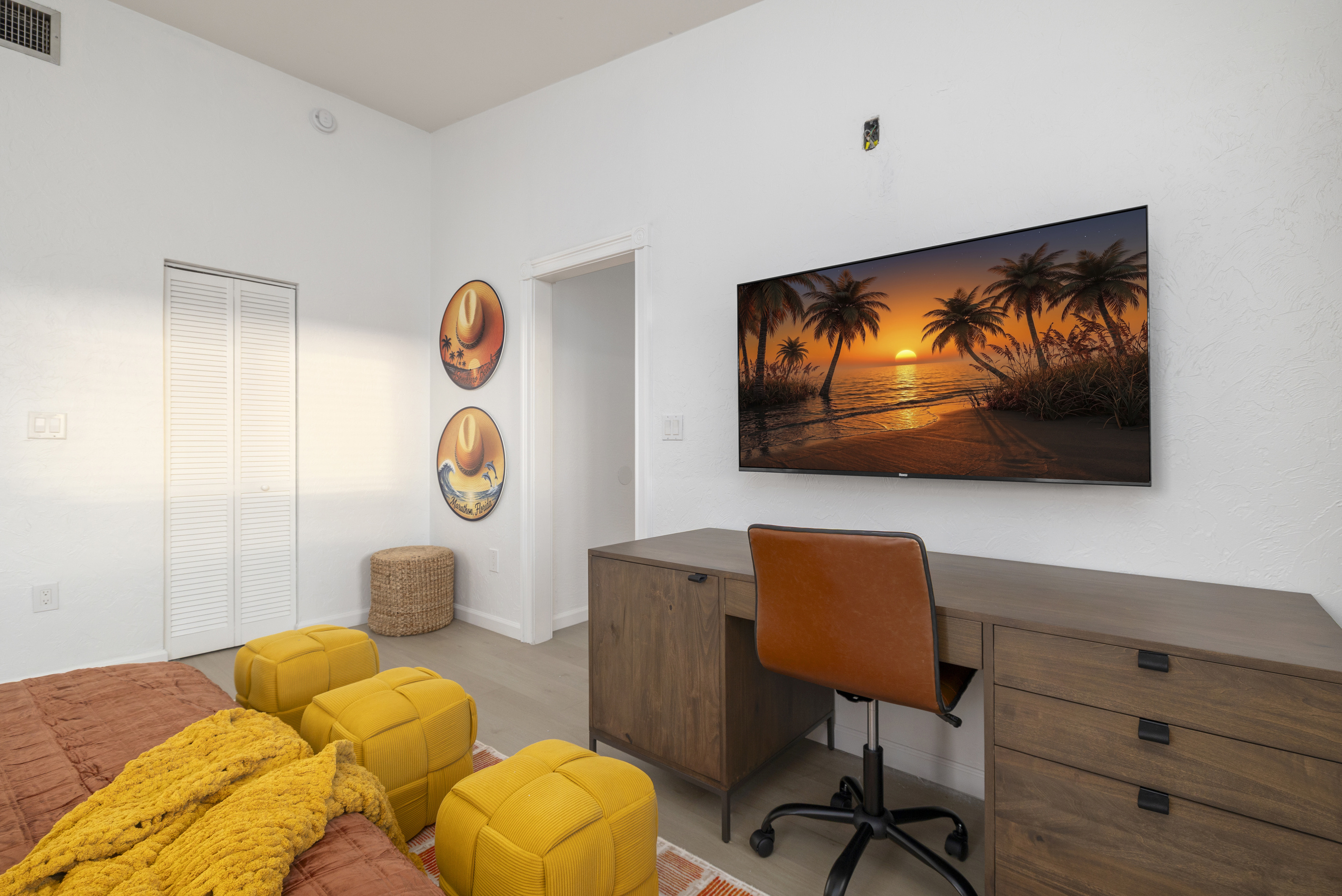 Like all the bedrooms, this bedroom has a large TV for your enjoyment.