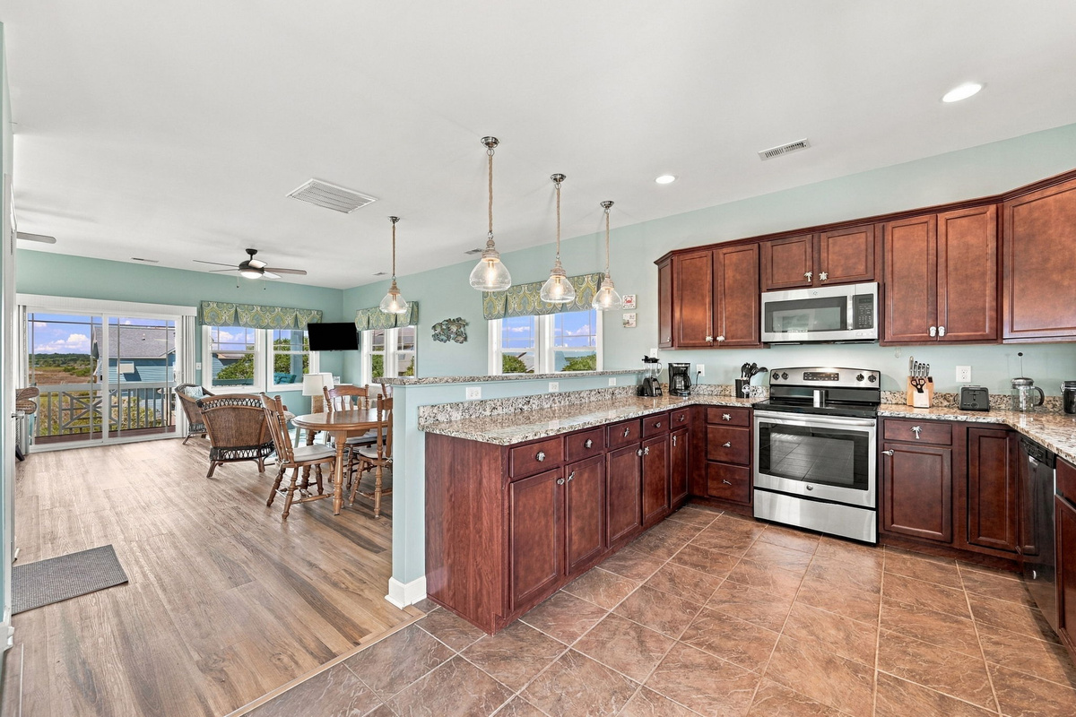 Open-concept kitchen and dining area offering plenty of space for cooking, gathering, and entertaining