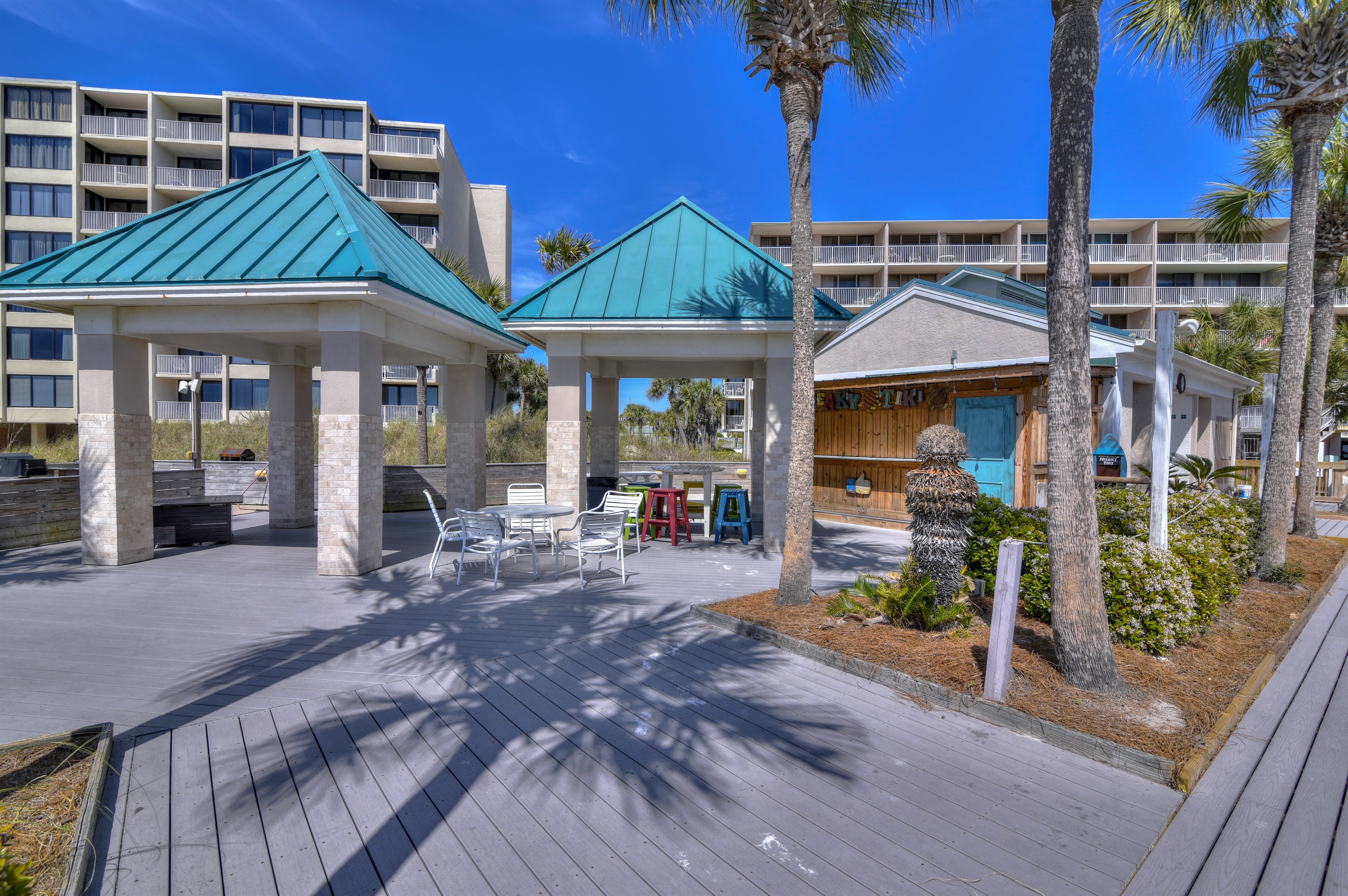 Gazebos adjacent to Sneaky Tiki