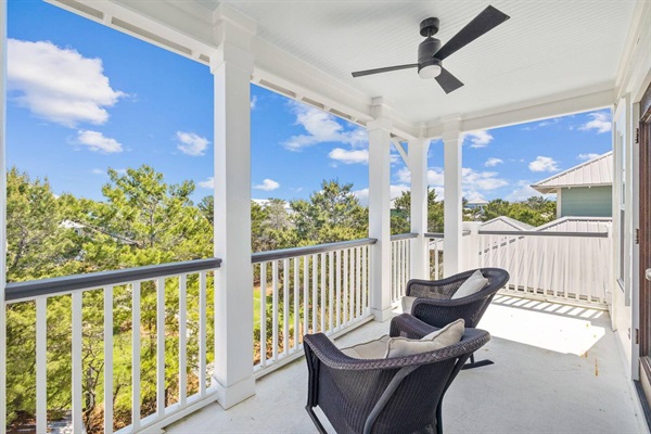3rd floor back balcony overlooks beautiful green space.