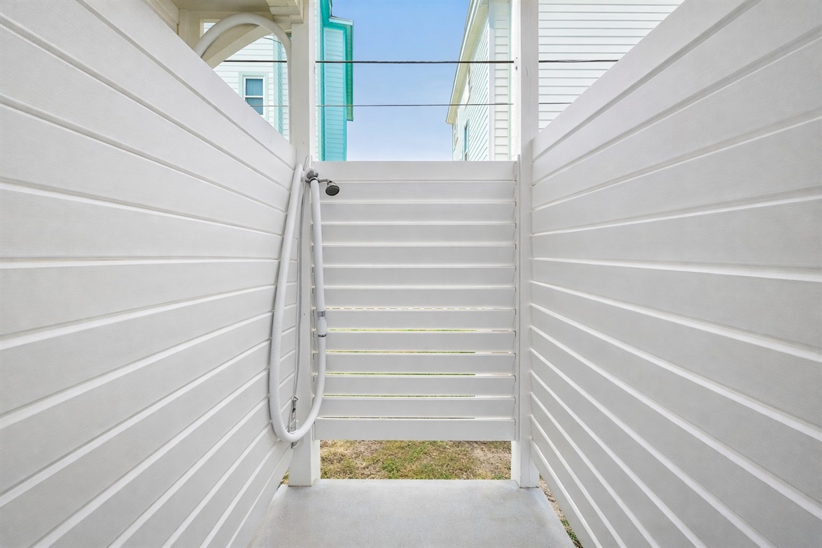 Outdoor Shower (Ground Level): Rinse off salt and sand before heading inside.