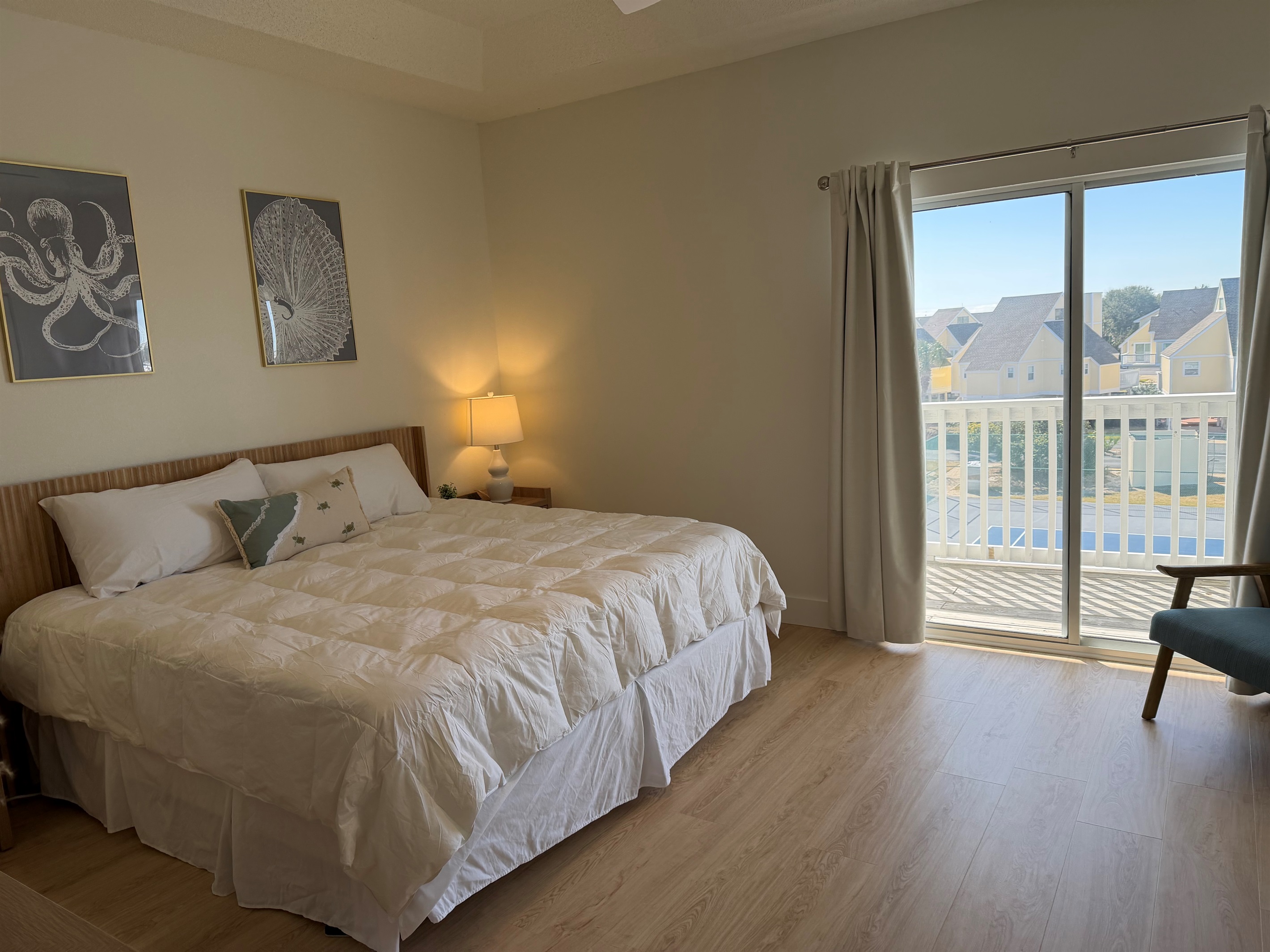 Newly renovated master bedroom with freshly painted walls and new LVP flooring!  Each nightstand has built-in charging capability for your Apple devices, with deep and roomy drawers for storage. 