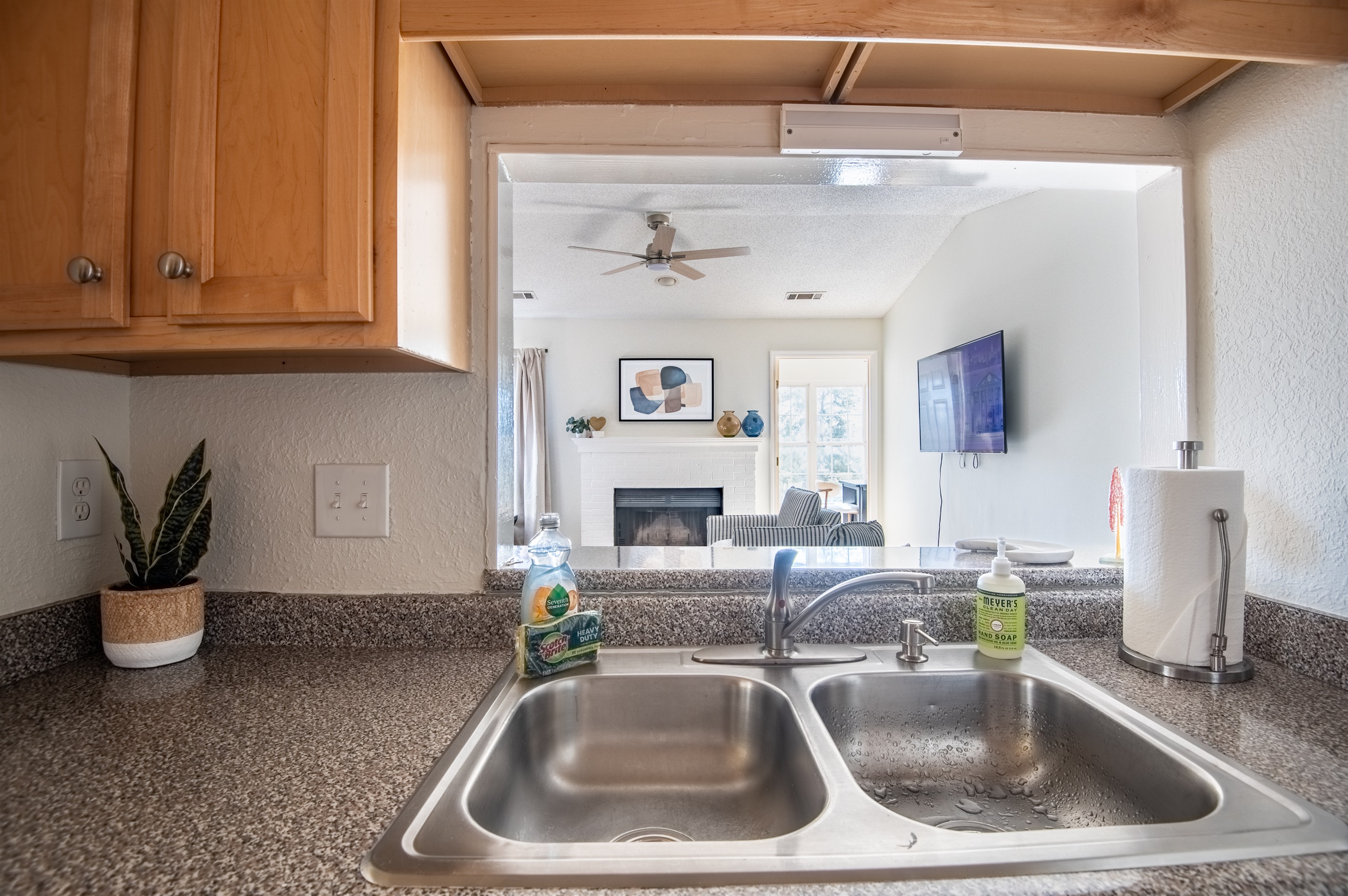 The open kitchen design helps you stay connected to the living space around it.