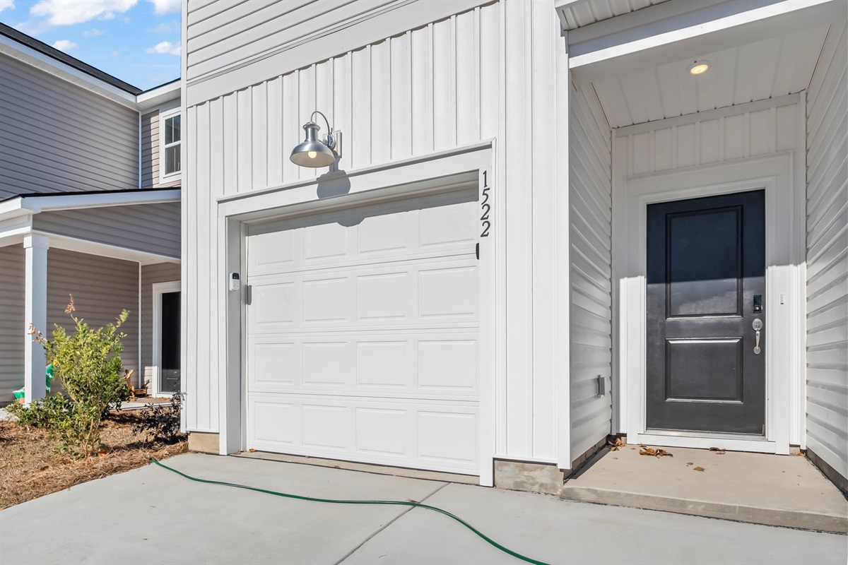 One car garage and room for two more cars in the driveway