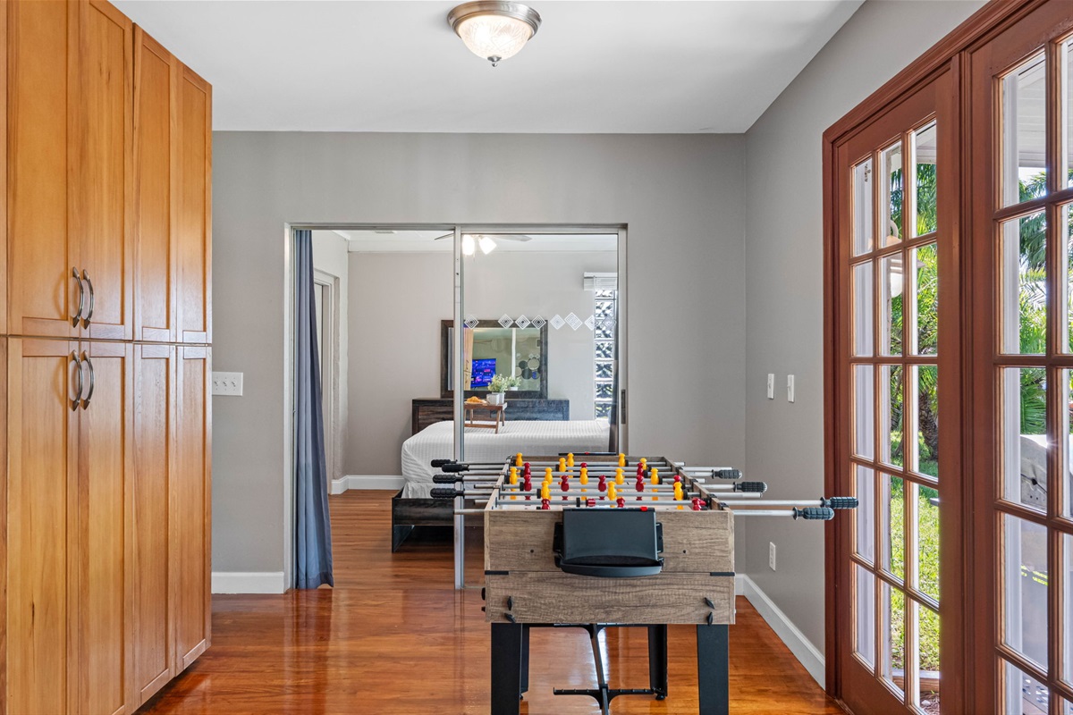 Enjoy your own private spot for relaxation and play, complete with a foosball table and warm hardwood floors.