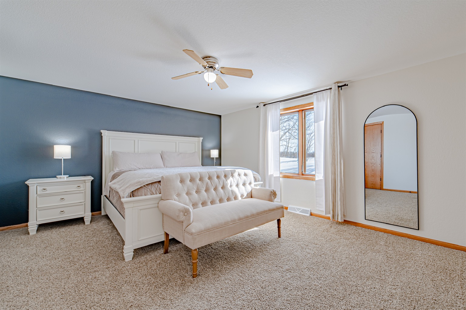 Master Suite fully equipped that features beautiful views of the lake, king size bed, smart TV, and walk-in closet!
