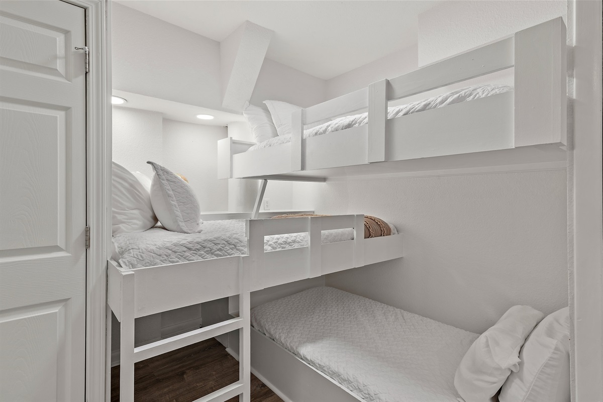 1st Floor - Bedroom 5: Three Twin Beds, access to hallway Remodeled Bathroom with walk in shower, Smart TV (Sleeps 3)