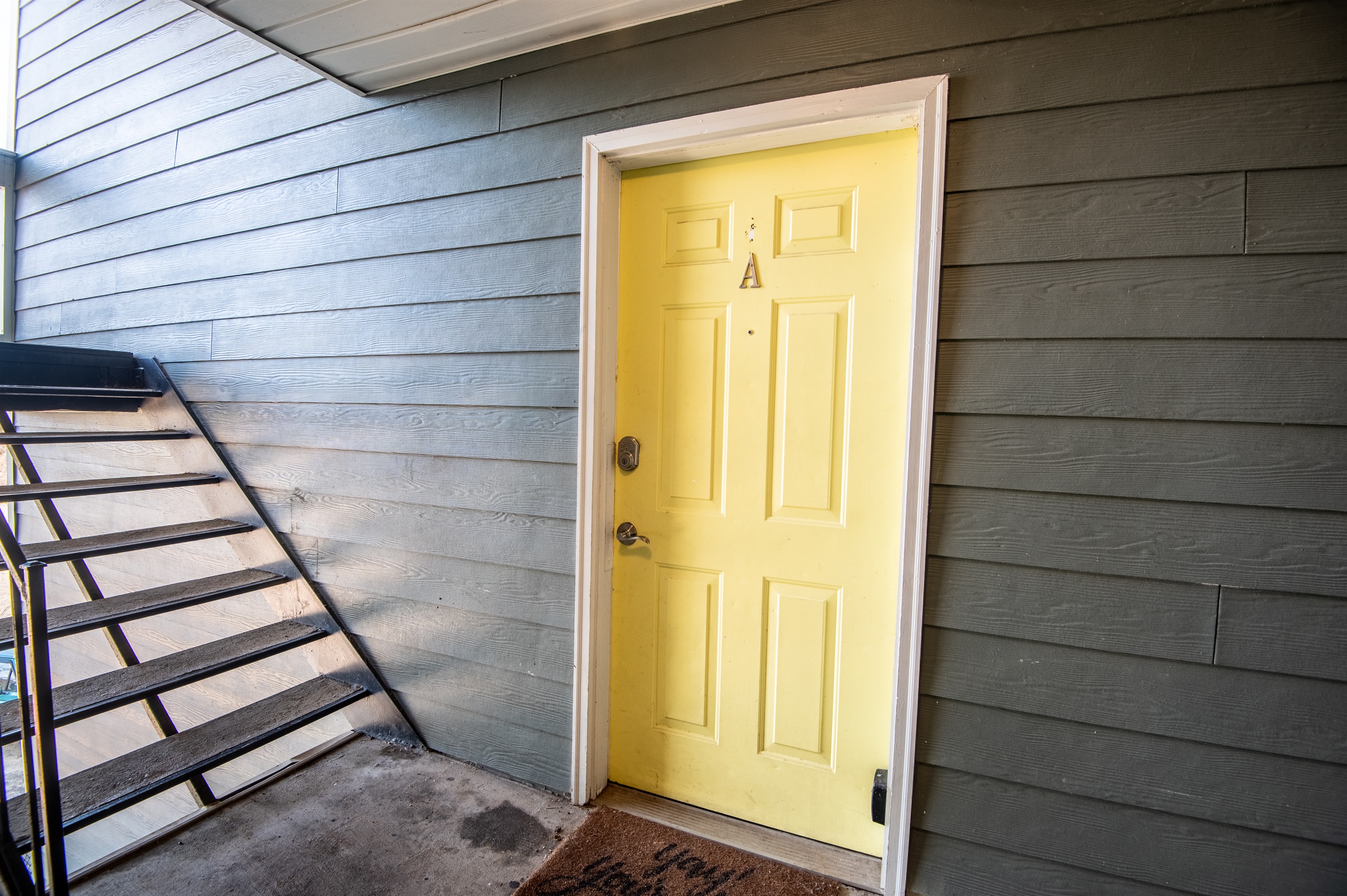 Welcome to Ridge Retreats - Unit A! Here is the entrance to your unit with a good look at the smart lock for easy check-in.