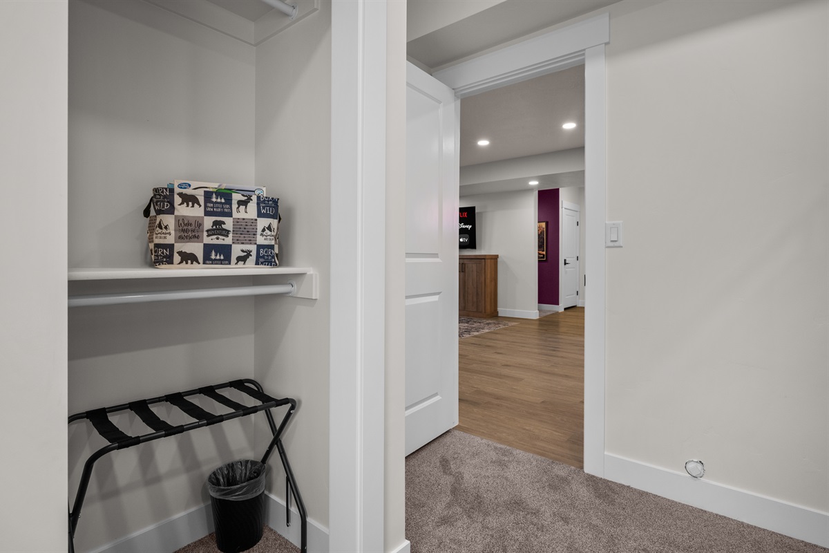A walk-in closet provides ample storage.