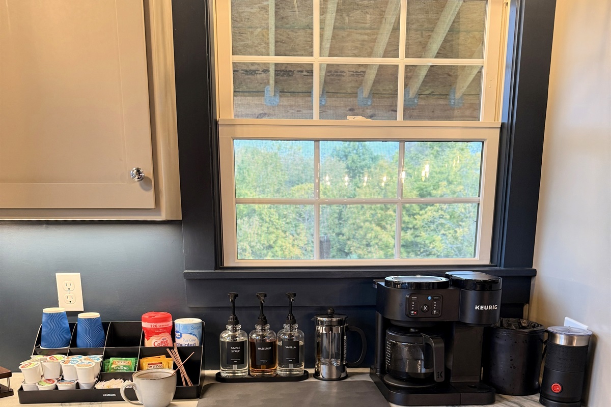 Start the day like a bourbon executive — the coffee and tea bar awaits with curated syrups, artisan blends, and everything you need to craft your perfect cup before the day’s tastings or meetings begin.