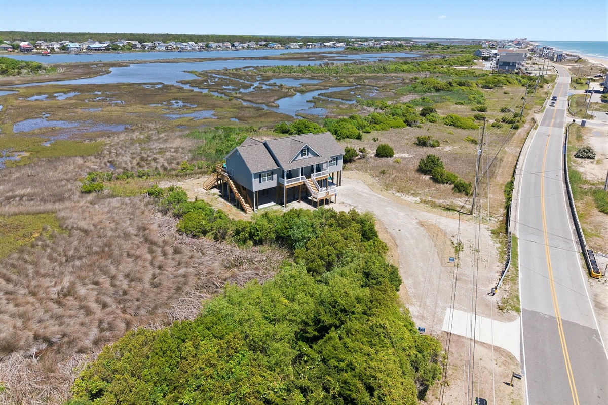 Prime location between ocean and marsh&mdash;enjoy sunrise beach walks and sunset views