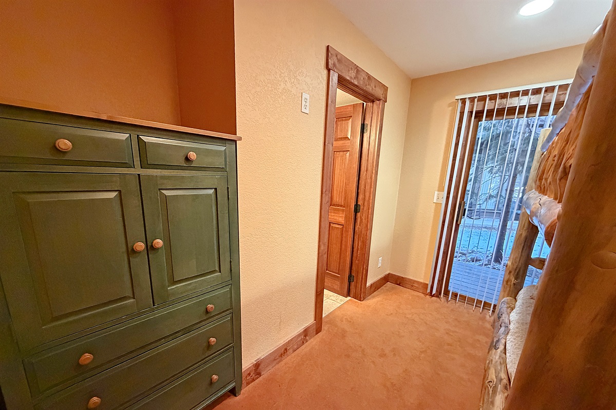 Bedroom #3 with Queen-over-Queen bunk beds and attached bathroom.