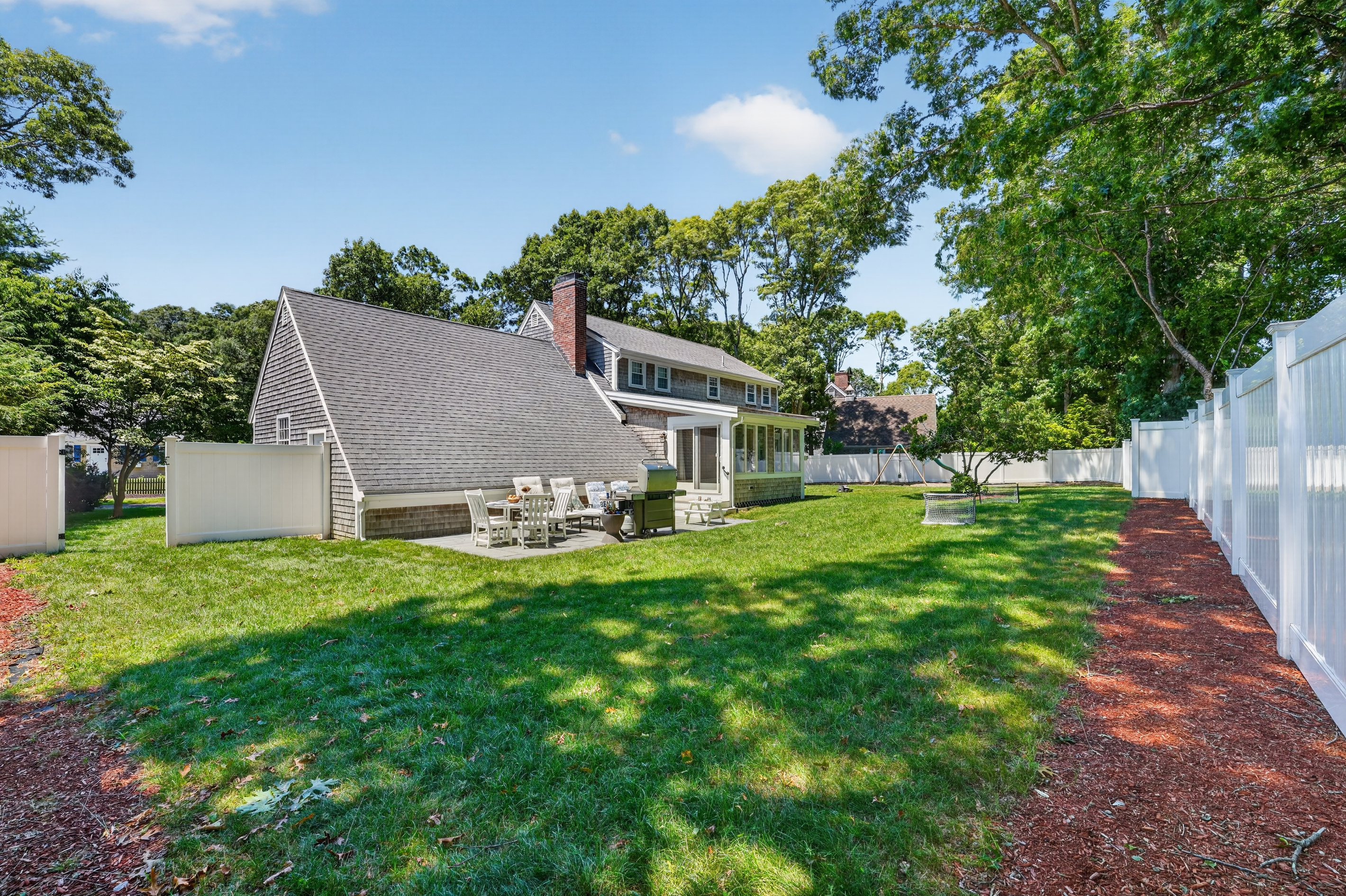 Spacious backyard offering room to relax, play, and enjoy the fresh coastal air.