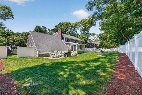 Spacious backyard offering room to relax, play, and enjoy the fresh coastal air.