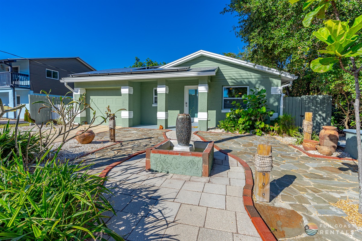 Front Entrance (Enclosed garage is for storage only.)