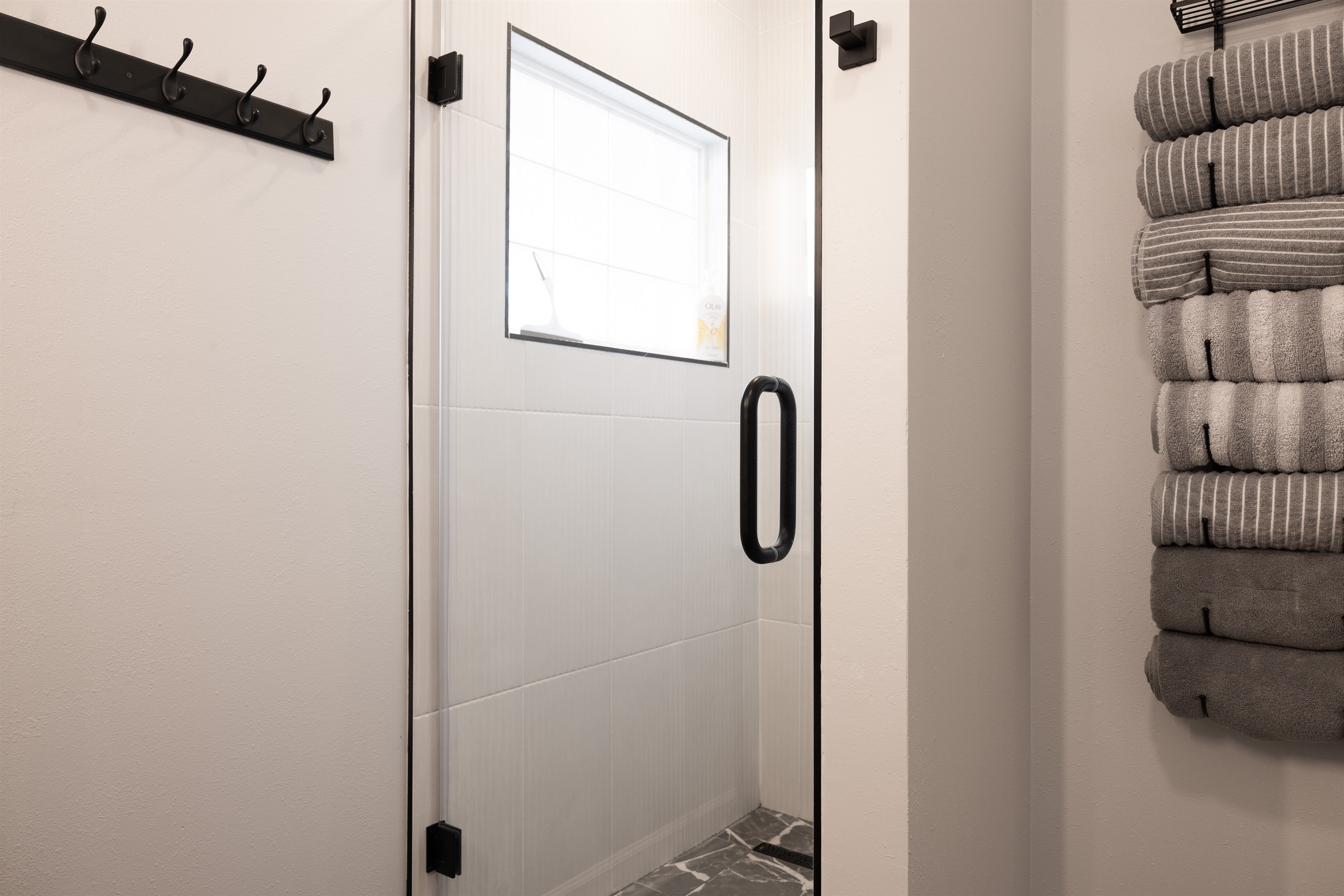 Main Floor Bathroom. 36x48 walk in shower with dual shower heads.