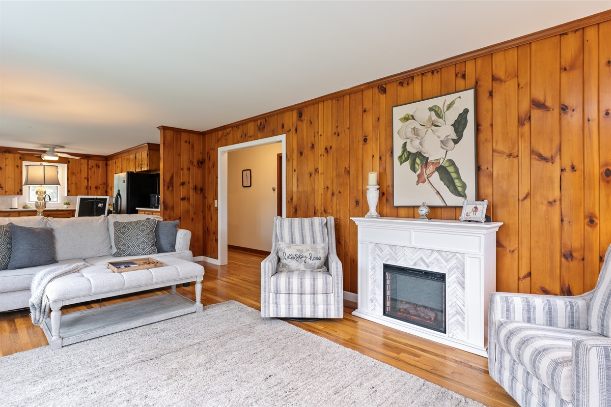 Spacious living room with electric fire place