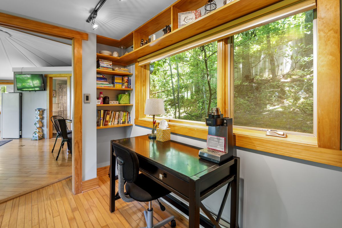Desk area with view into main room