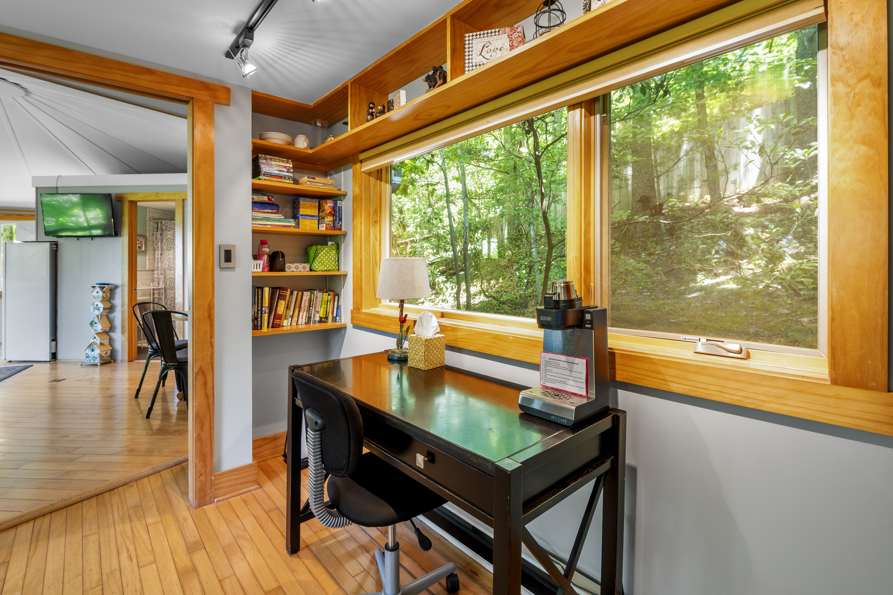 Desk area with view into main room