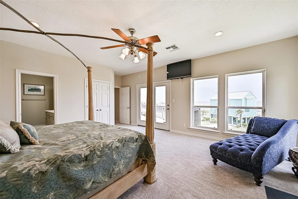 Large Primary Bedroom is in its own wing with fireplace, deck and ensuite bathroom