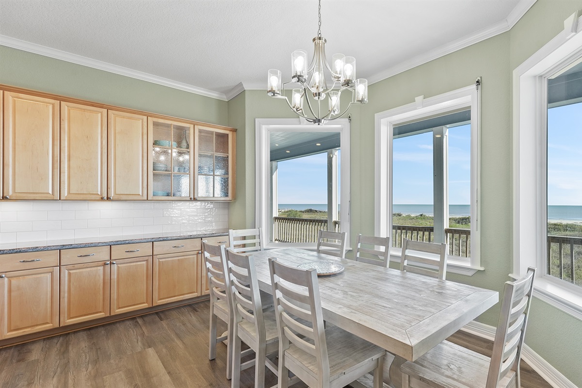 Gather around our large dining table with beach views - perfect for memorable family meals and game nights.