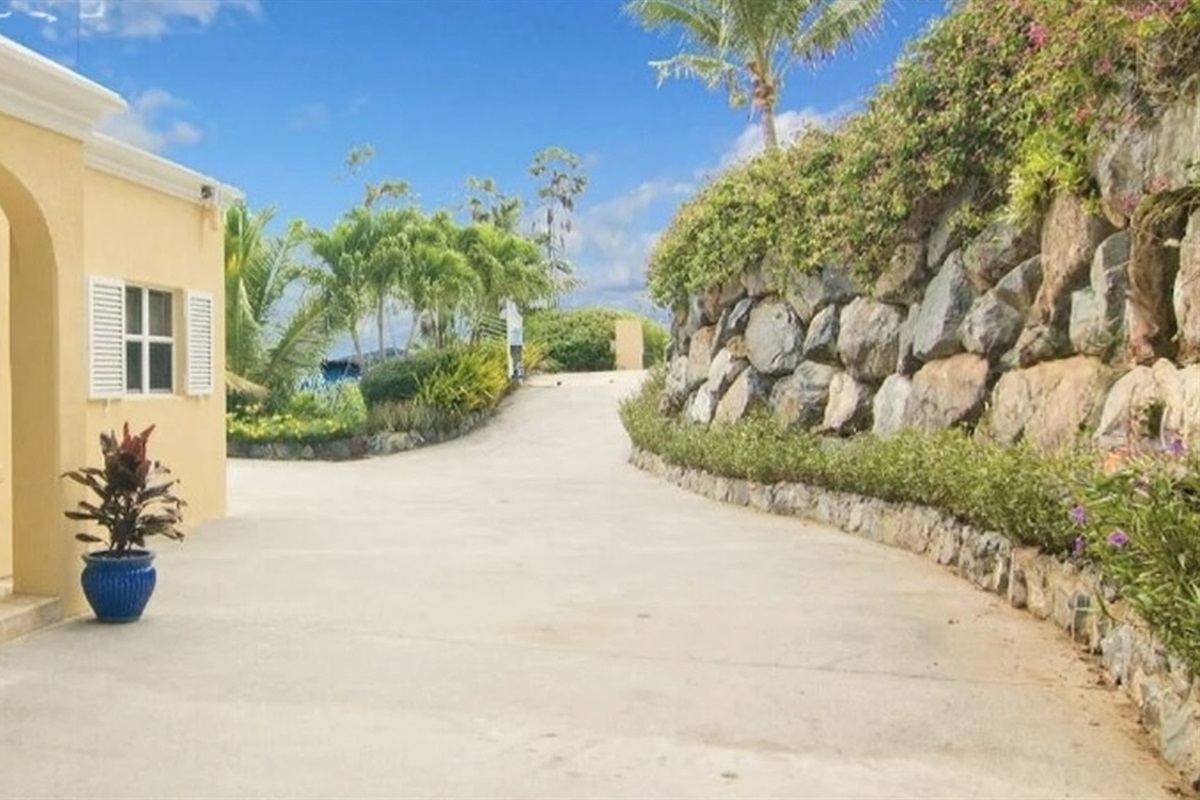 Rare wide, flat driveway with easy parking for up to 3 cars in the USVI.