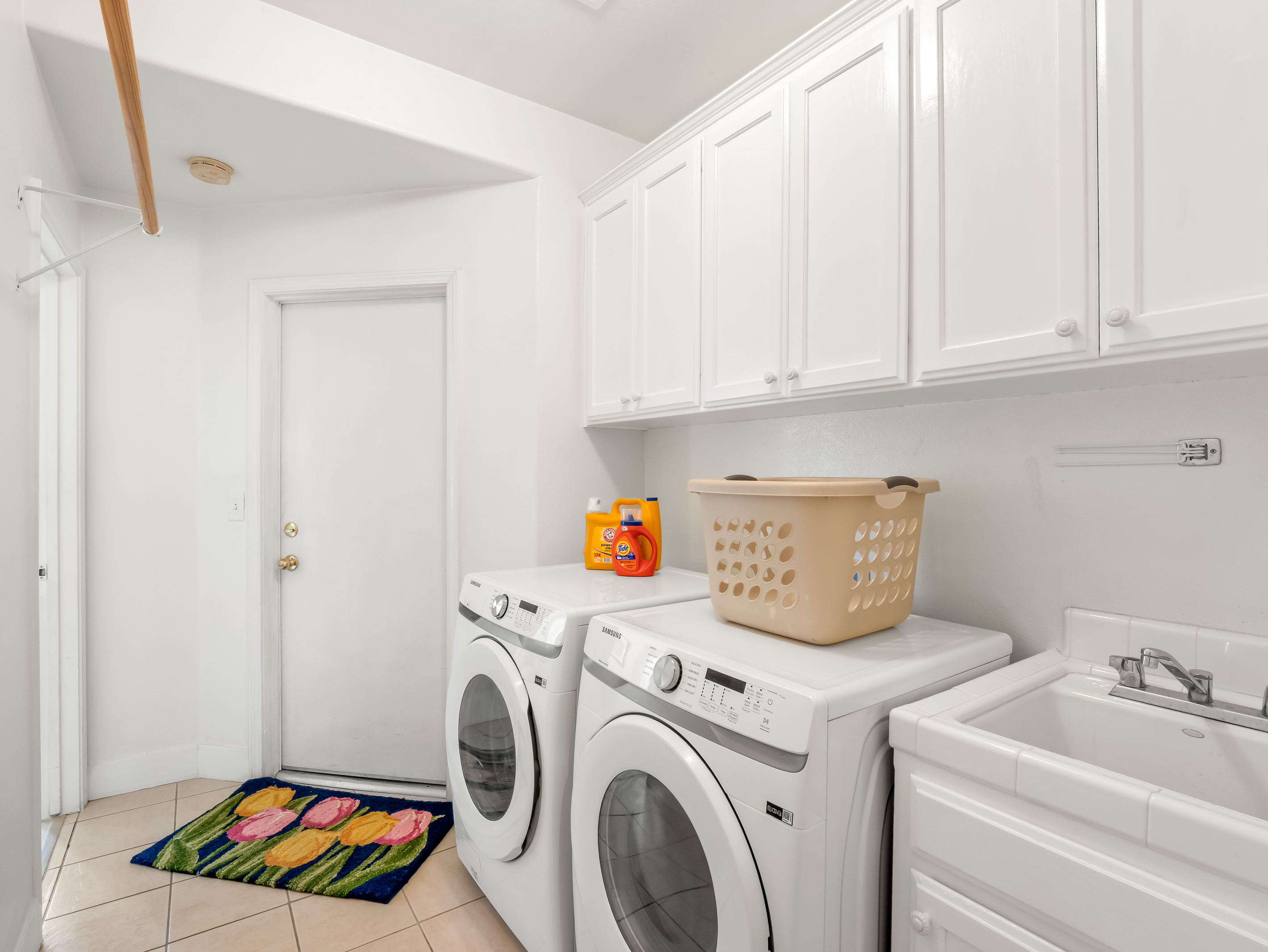 Enjoy the convenience of a dedicated laundry room equipped with a full-size washer and dryer, making it easy to keep clothes fresh during extended stays and family vacations.