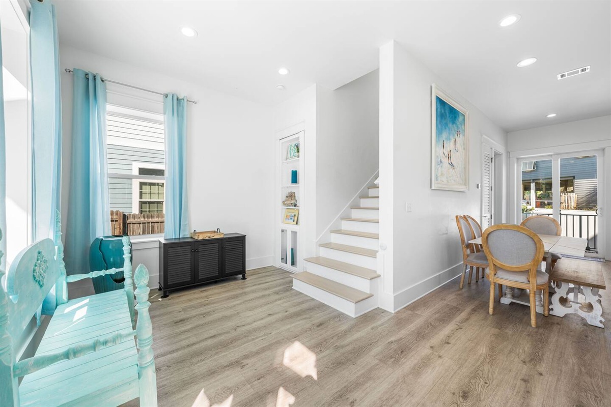 Step into serenity! ✨ Our 30A open-concept retreat welcomes you with a calming Feng Shui fountain, whimsical bench, and curated coastal art. A perfectly balanced entrance designed to start your beach vacation with pure, modern zen