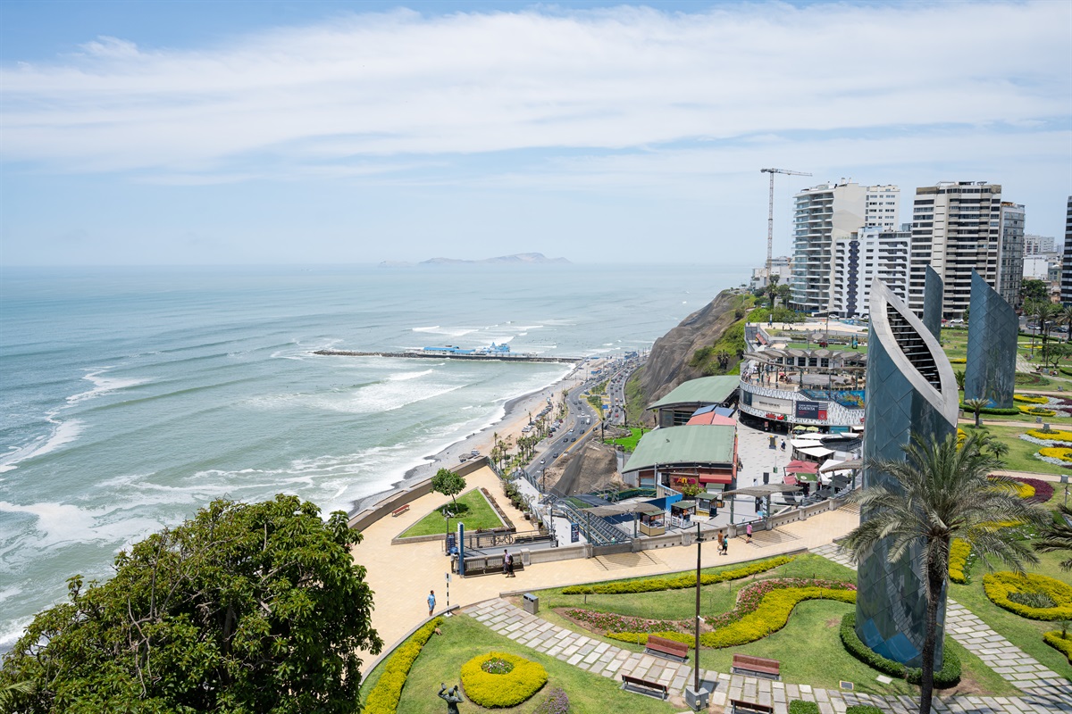 View from the living room and balcony to the Malecón and the Pacific Ocean — a postcard-perfect moment every day.  (Photo taken from apartment balcony)
