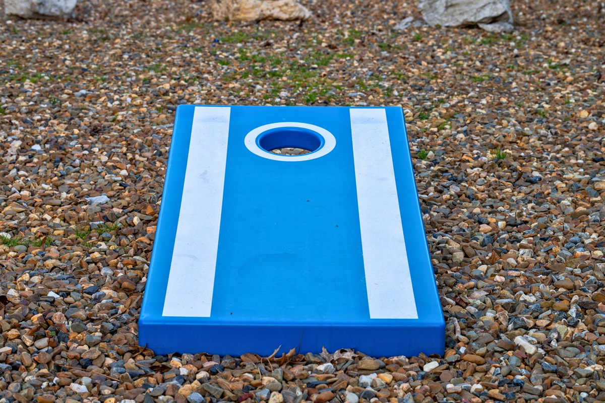 Cornhole is set up and ready for friendly competition, making the outdoor space even more enjoyable for groups.