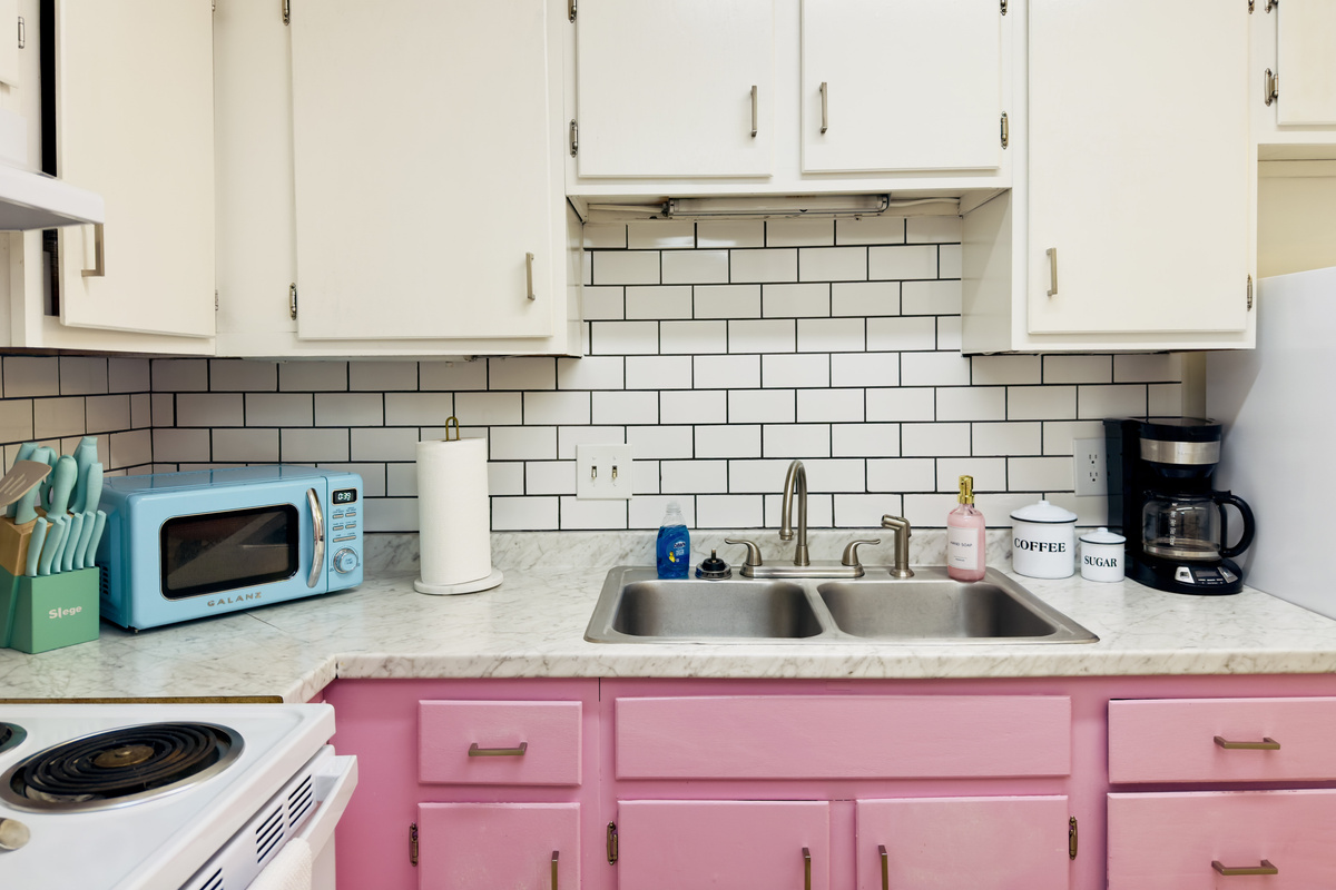 Kitchen with coffee, creamer, and sugar provided.