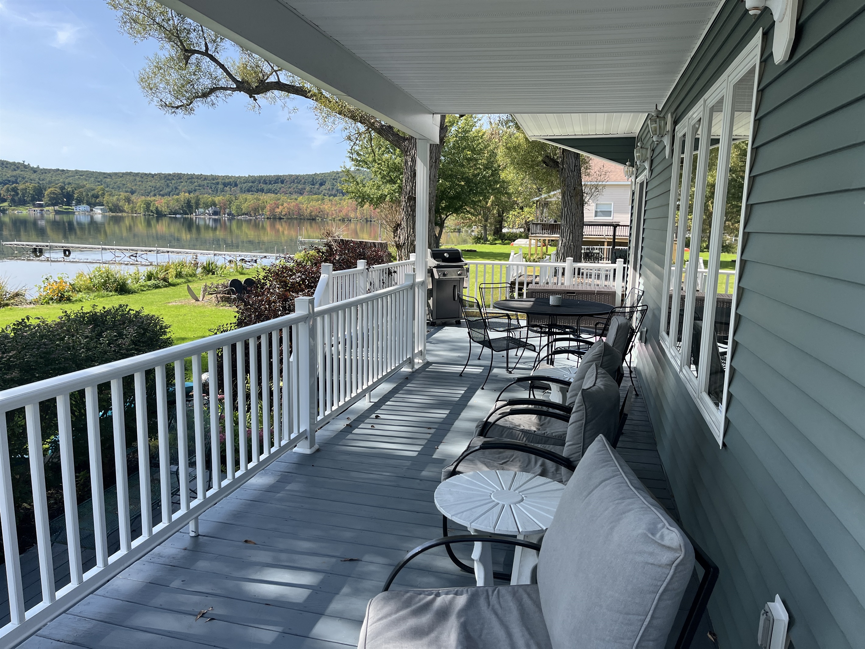 Covered deck overlooking the waters of Canadarago Lake