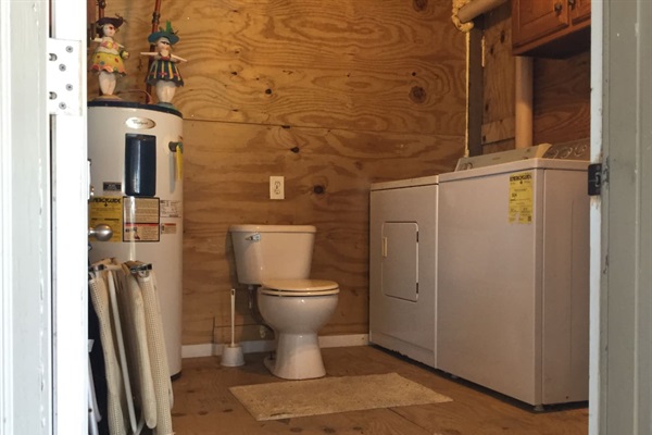 Laundry room and 1/2 bath for a quick run from the beach.