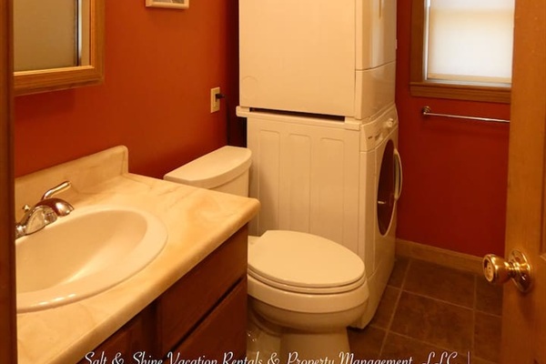 Full bath with washer and dryer