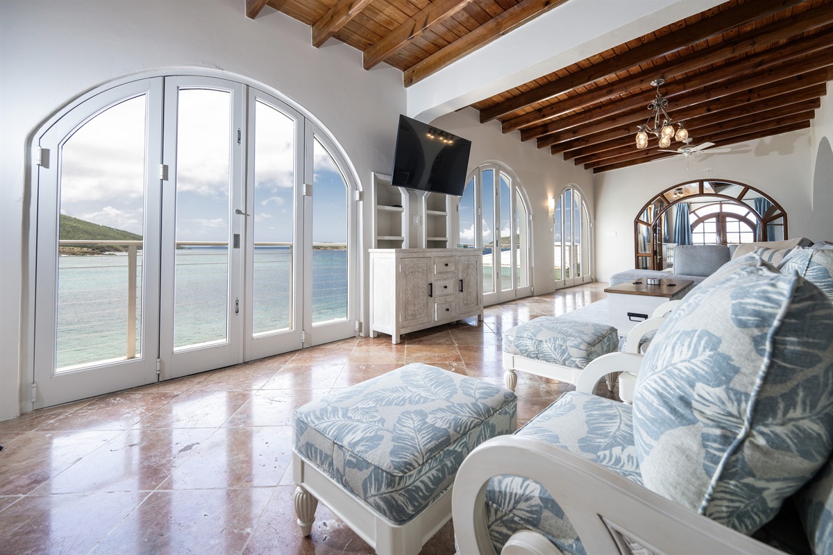 Elegant archways frame sweeping ocean vistas in the main living area.