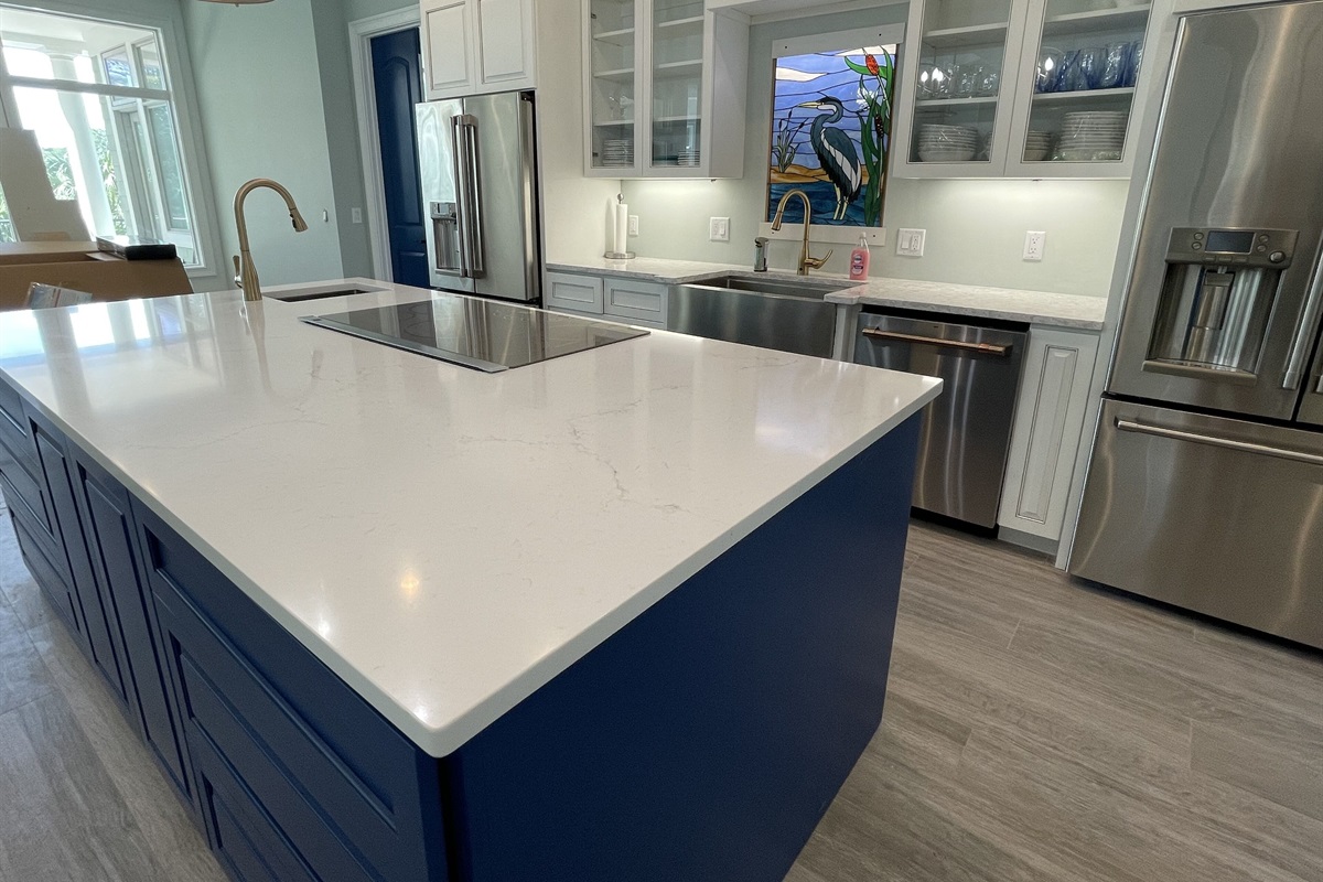 8ft center island with induction cooktop which faces the living  & game room