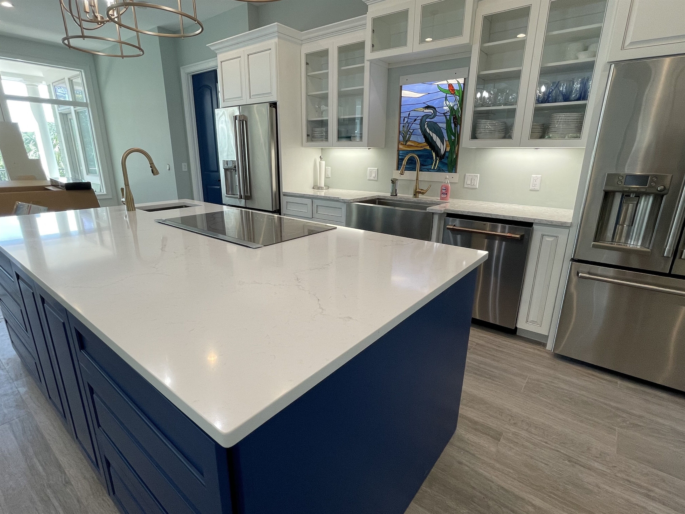 8ft center island with induction cooktop which faces the living  & game room