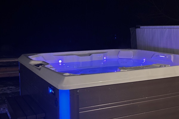 End your day with a relaxing soak in the hot tub at night