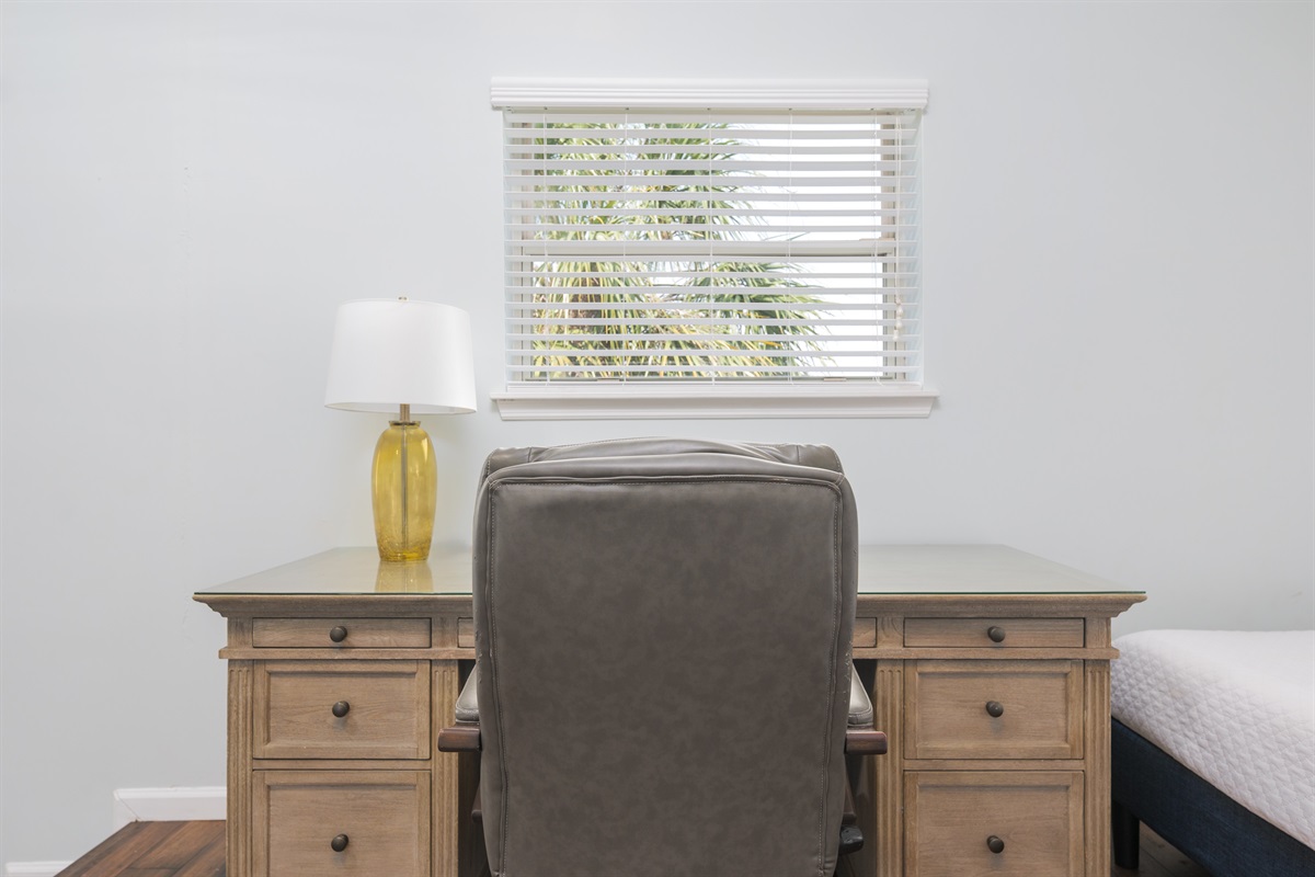 Need to work while away? A quiet corner with a desk and natural light makes it easy