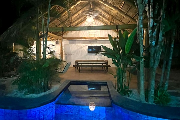 Grand cabana at night great for movie night, board games or just hanging out and having fun!
