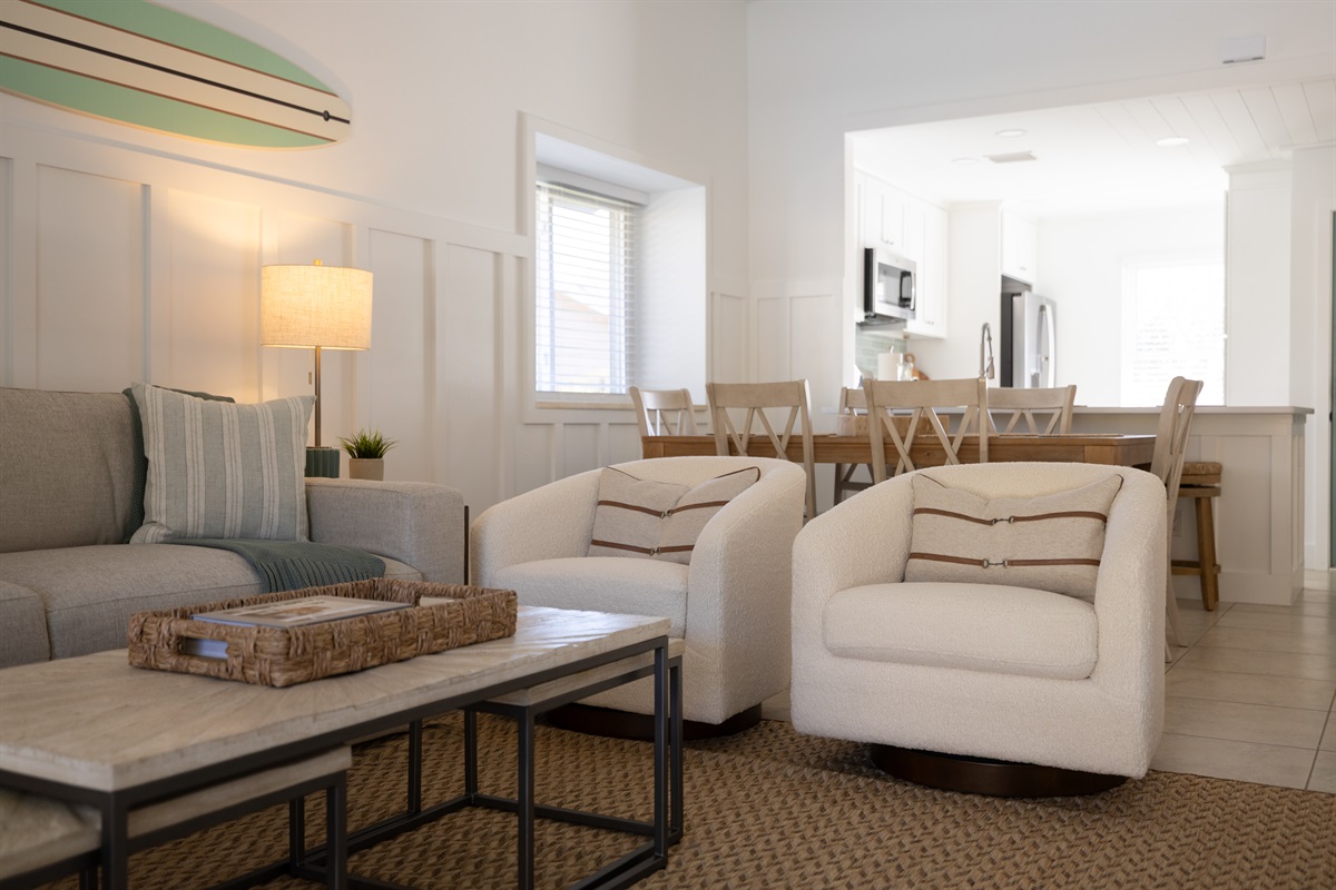 Relax in elevated coastal comfort 🌊
Plush seating, warm textures, and an open layout designed for gathering after sun-filled days