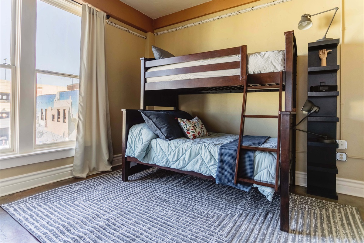 Twin bunk over Queen Bed (sleeps three)