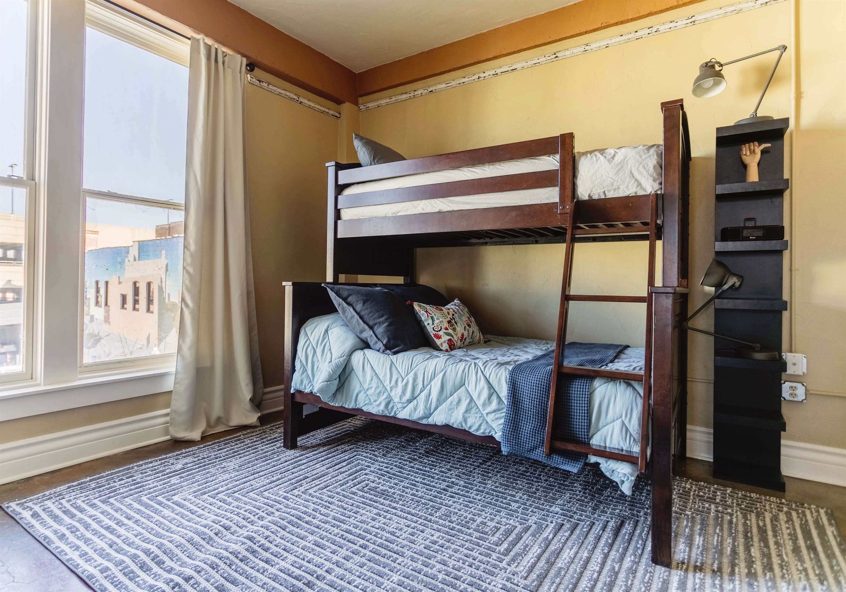 Twin bunk over Queen Bed (sleeps three)