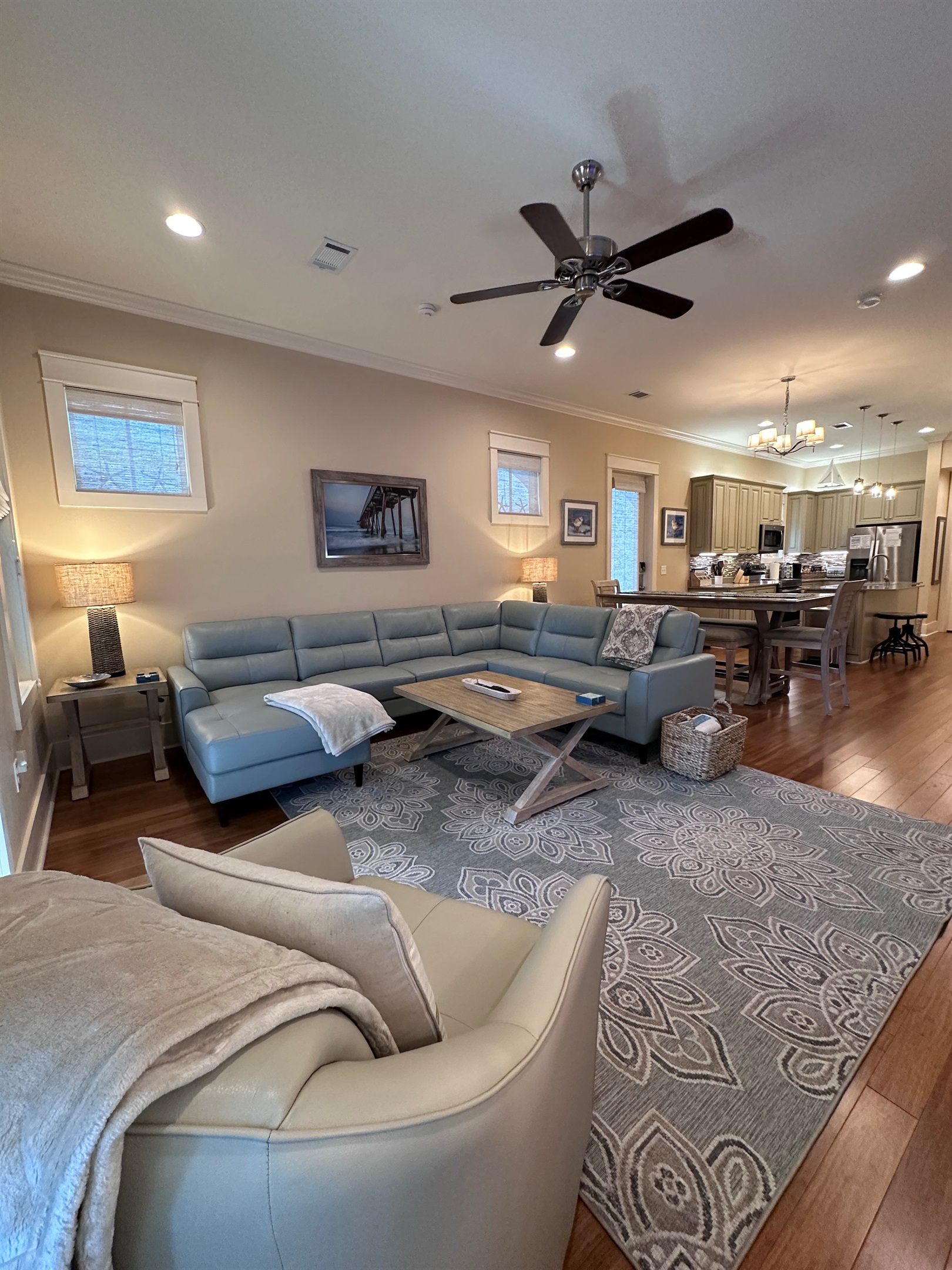 View of the downstairs Living/Dining/Kitchen area as viewed from the front of the living room, looking back towards the kitchen.  Open, non-cluttered, and airy!  