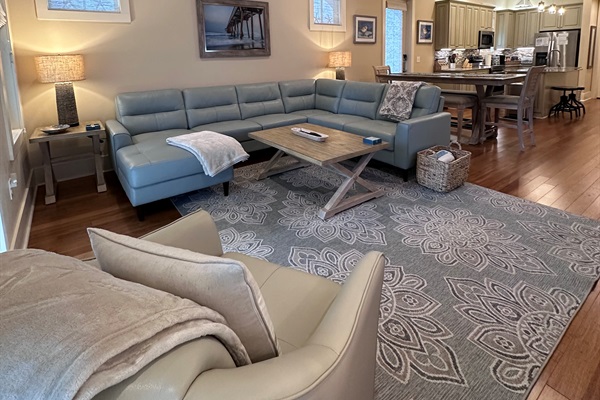 View of the Living/Dining/Kitchen from the front of the living room, looking back towards the kitchen. 